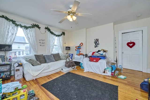bedroom featuring ceiling fan and wood finished floors
