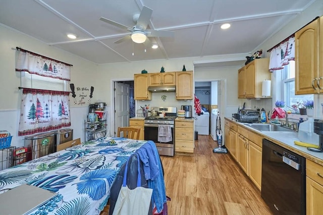 kitchen with stainless steel range with gas stovetop, washer and clothes dryer, black dishwasher, ceiling fan, and under cabinet range hood