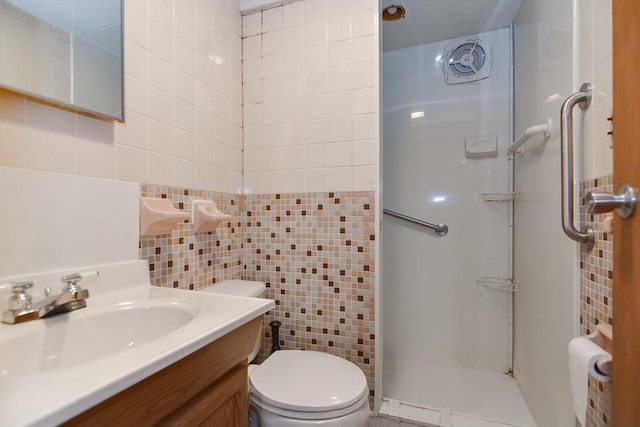 bathroom featuring backsplash, walk in shower, vanity, tile walls, and toilet