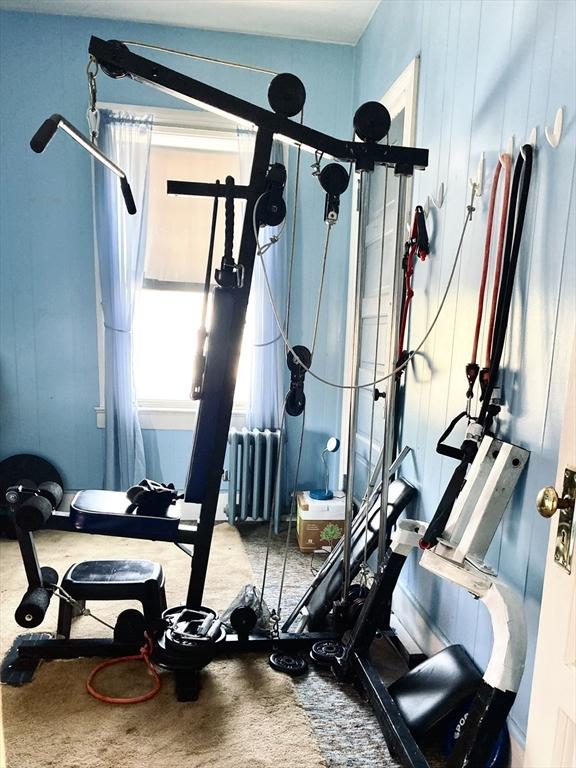 1123 S Broadway, East Providence, RI 02914 - workout room featuring carpet floors and radiator