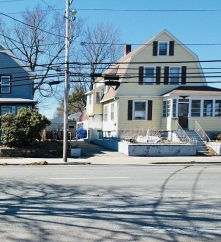 1123 S Broadway, East Providence, RI 02914 - view of front of home with a chimney and a gambrel roof