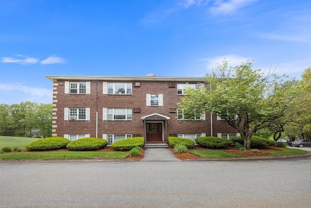 118 Parker St Unit 16, Acton, MA 01720 - view of front facade featuring brick siding