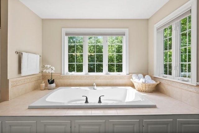 bathroom with a garden tub