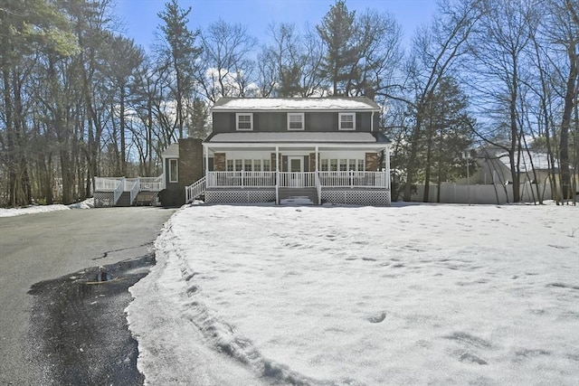 view of front of home featuring covered porch