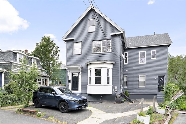17 Bow Street Pl Unit 2, Somerville, MA 02143 - view of front of home with entry steps and a shingled roof