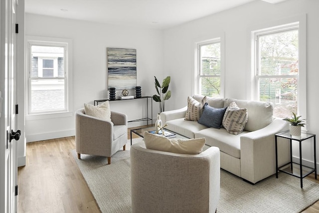 17 Bow Street Pl Unit 2, Somerville, MA 02143 - living area with light wood-style flooring and baseboards