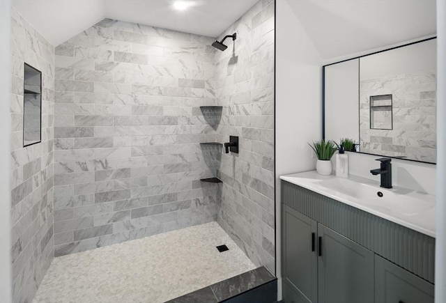 17 Bow Street Pl Unit 2, Somerville, MA 02143 - bathroom featuring vanity, tiled shower, and lofted ceiling
