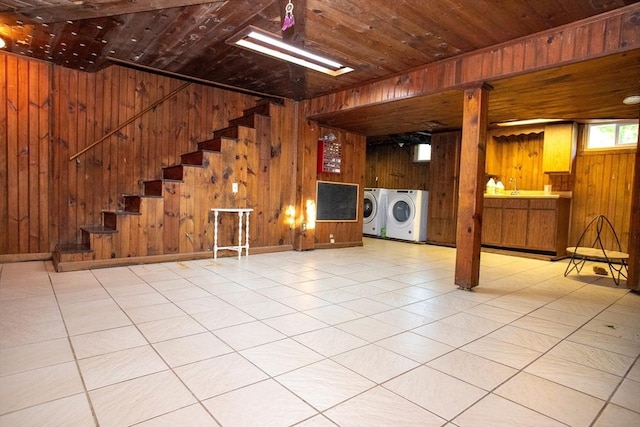 42 Giasson St, Hudson, MA 01749 - below grade area with independent washer and dryer, wood walls, stairs, and wooden ceiling