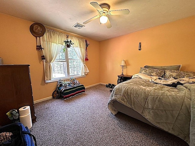 bedroom featuring baseboards, carpet, a ceiling fan, and visible vents