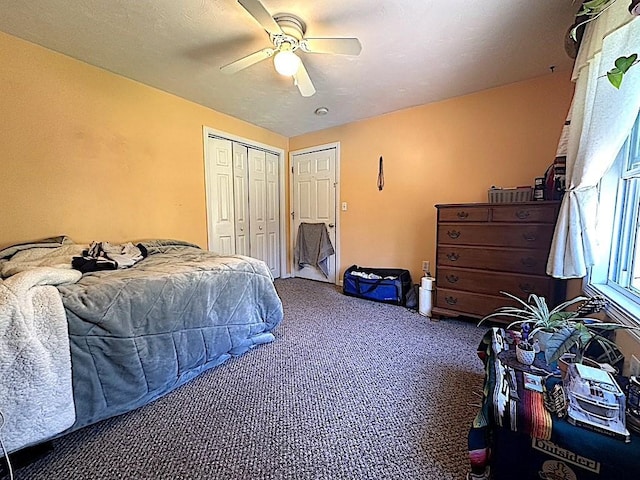 bedroom featuring a closet, a ceiling fan, and carpet flooring