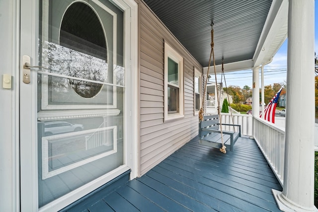 wooden deck featuring a porch