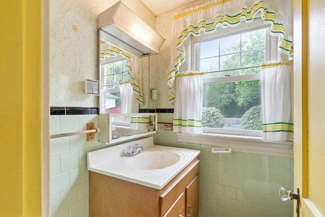 34 Worcester St, Grafton, MA 01519 - bathroom with vanity and tile walls