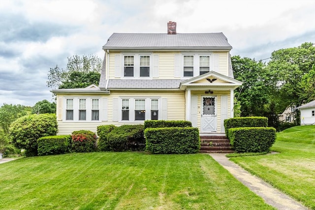 34 Worcester St, Grafton, MA 01519 - dutch colonial with a front lawn and a chimney