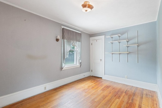 34 Worcester St, Grafton, MA 01519 - empty room featuring light wood-style floors, baseboards, and crown molding