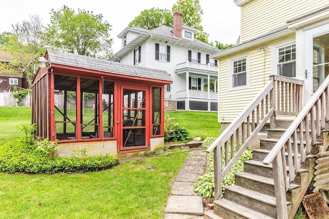 34 Worcester St, Grafton, MA 01519 - view of green lawn with a sunroom