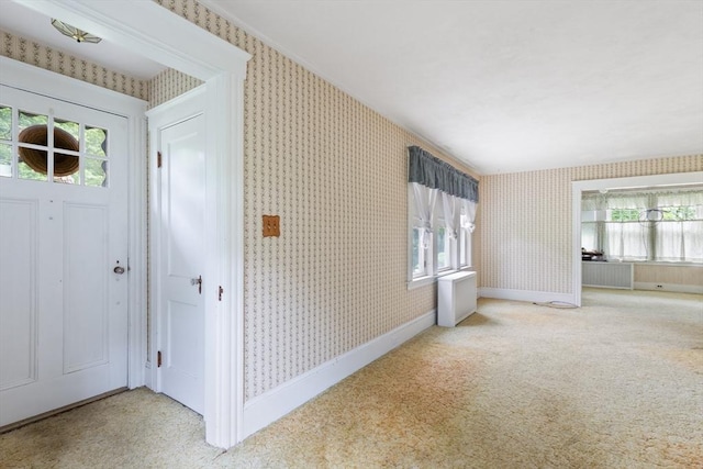 34 Worcester St, Grafton, MA 01519 - carpeted foyer featuring wallpapered walls and baseboards