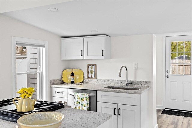 216 Waltham St, Hanson, MA 02341 - kitchen with a sink, stainless steel dishwasher, light stone countertops, gas stovetop, and recessed lighting