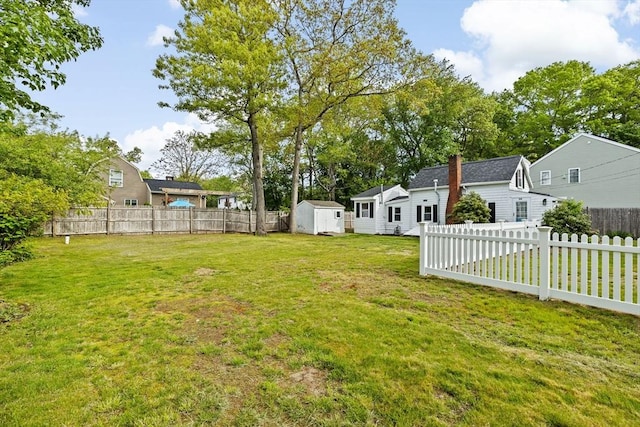216 Waltham St, Hanson, MA 02341 - view of yard featuring a storage shed and an outbuilding