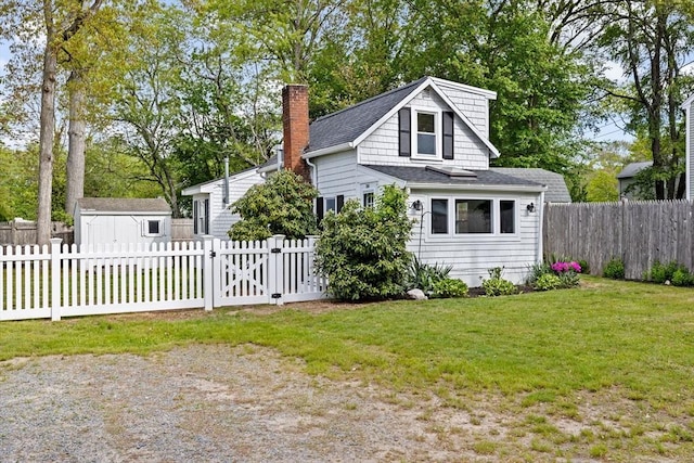 216 Waltham St, Hanson, MA 02341 - view of home's exterior featuring a chimney and an outdoor structure