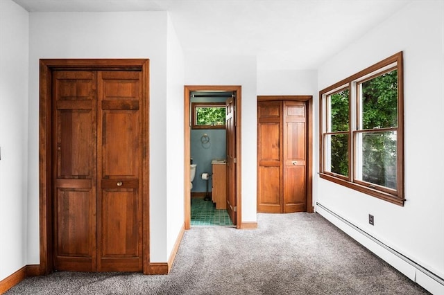 31 Cedar Hill Ter, Swampscott, MA 01907 - unfurnished bedroom with a baseboard radiator, carpet, and baseboards