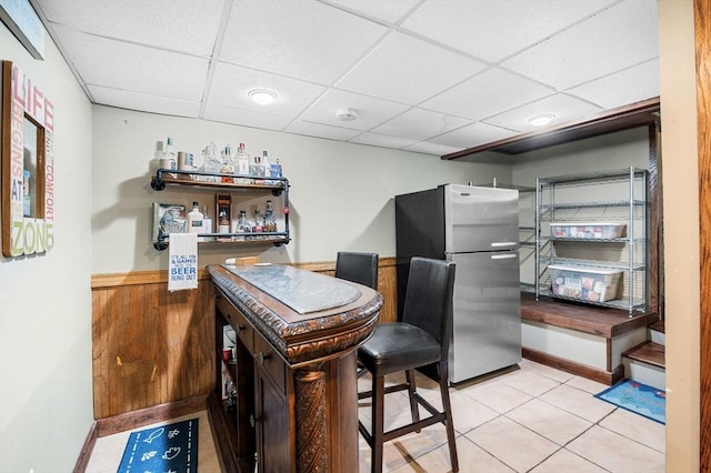 31 Cedar Hill Ter, Swampscott, MA 01907 - bar area featuring freestanding refrigerator, a paneled ceiling, and tile patterned flooring