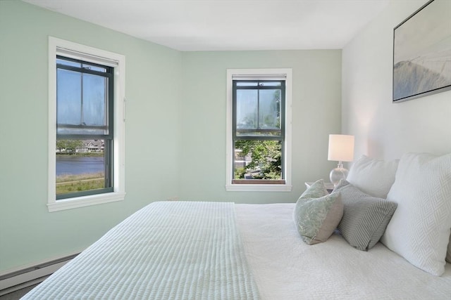 bedroom featuring a baseboard radiator