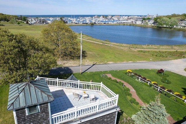 drone / aerial view with a water view