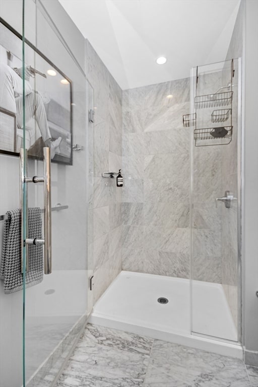 bathroom featuring an enclosed shower