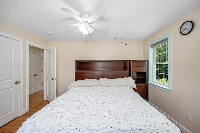 44 Sachem St, Waltham, MA 02451 - bedroom featuring ceiling fan, light wood-style floors, and baseboards