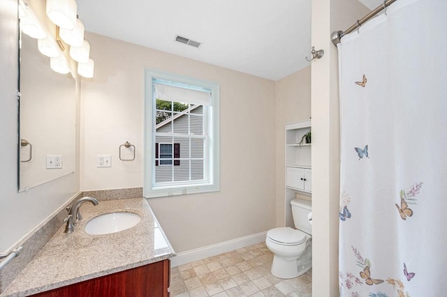 44 Sachem St, Waltham, MA 02451 - full bathroom with vanity, toilet, baseboards, and a shower with curtain