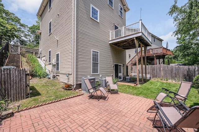 44 Sachem St, Waltham, MA 02451 - rear view of house with stairway, a deck, and a patio