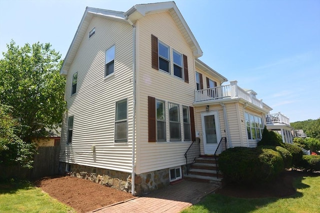 204 Maple St, Boston, MA 02132 - view of front of house with a balcony and entry steps