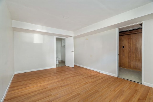 204 Maple St, Boston, MA 02132 - unfurnished bedroom with light wood finished floors and ensuite bath