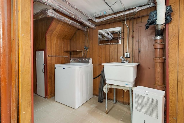 204 Maple St, Boston, MA 02132 - laundry area with washer / dryer, light tile patterned floors, and wooden walls