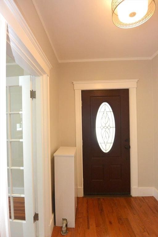 204 Maple St, Boston, MA 02132 - entryway with wood finished floors and crown molding