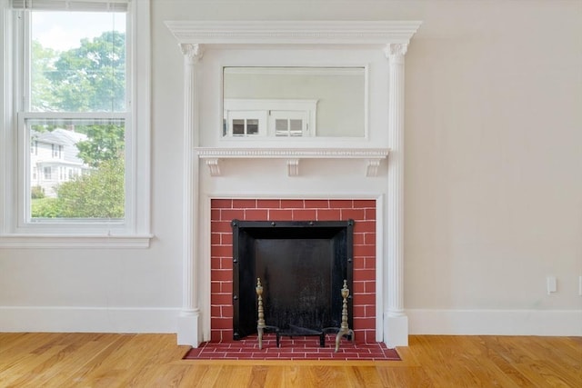 204 Maple St, Boston, MA 02132 - detailed view of a fireplace and wood finished floors