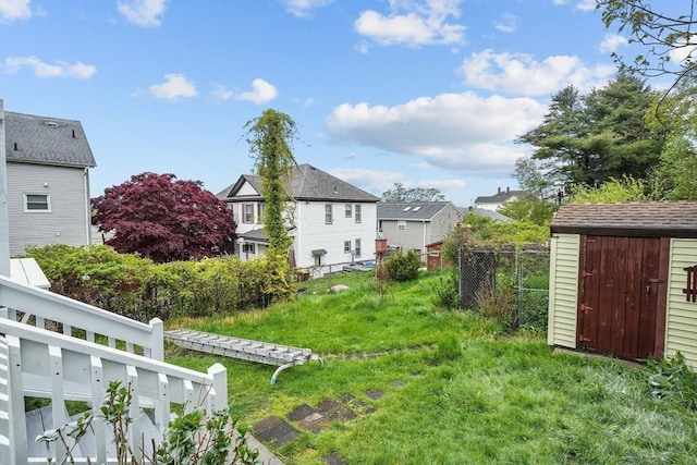 view of yard with a storage shed