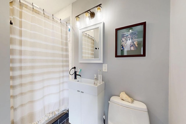 12 Lester Ter, Somerville, MA 02144 - full bath featuring toilet, a shower with curtain, and vanity