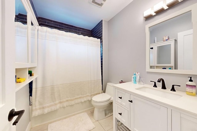 12 Lester Ter, Somerville, MA 02144 - full bath featuring vanity, toilet, and tile patterned floors