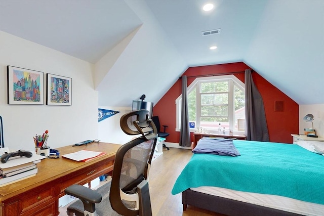 12 Lester Ter, Somerville, MA 02144 - bedroom featuring light wood-style floors, lofted ceiling, and an office area