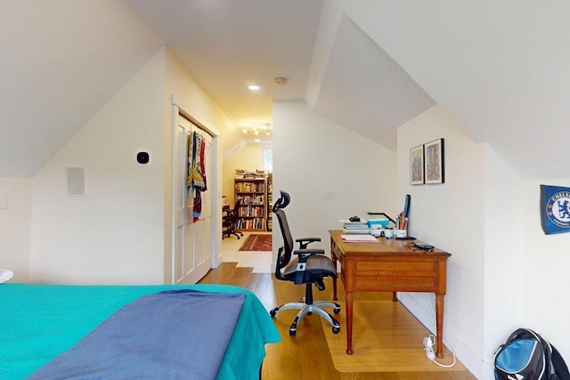 12 Lester Ter, Somerville, MA 02144 - bedroom featuring lofted ceiling, wood finished floors, baseboards, and a desk