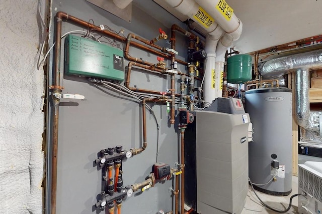 12 Lester Ter, Somerville, MA 02144 - utility room featuring water heater