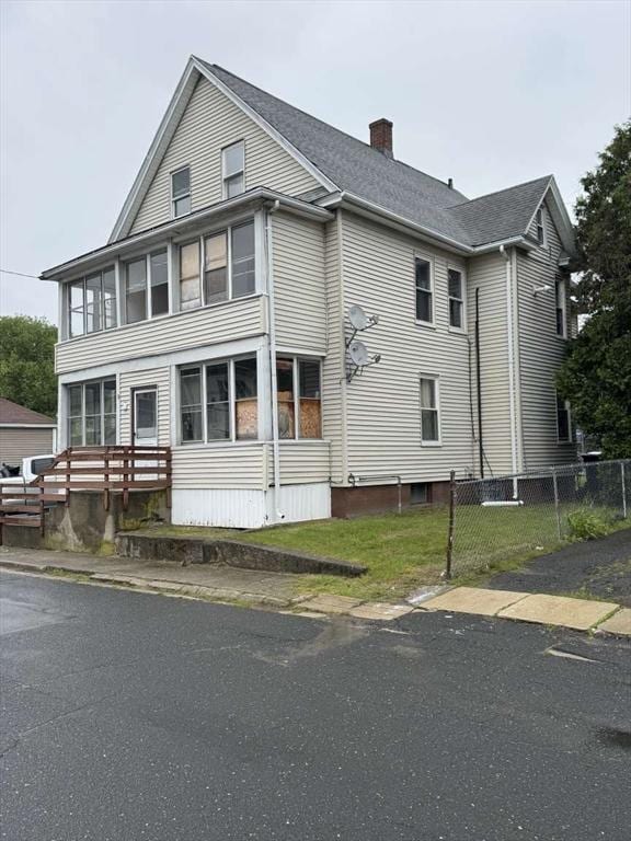5 Rogers Ave, Springfield, MA 01151 - view of side of home featuring a chimney