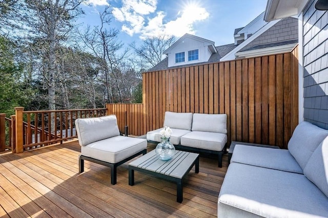 deck with an outdoor hangout area