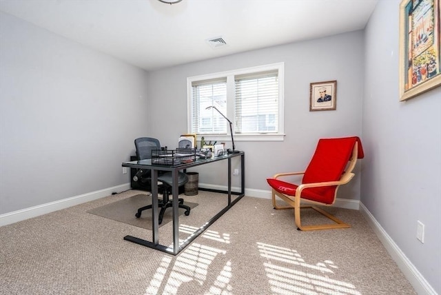 home office featuring carpet, visible vents, and baseboards