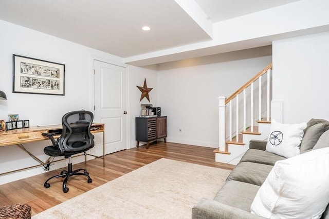 office featuring recessed lighting, baseboards, and wood finished floors