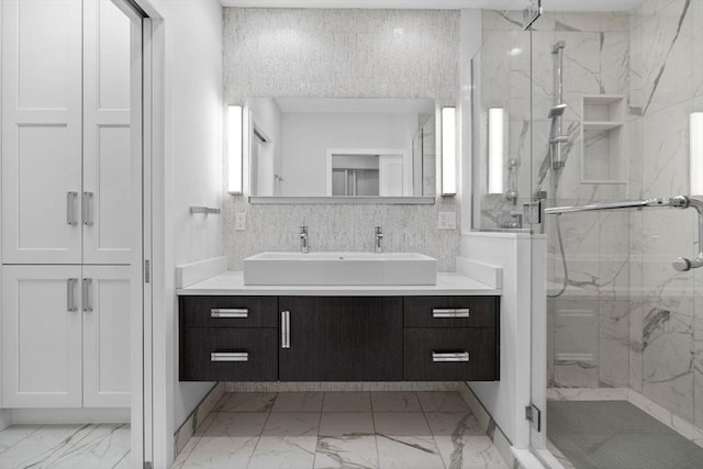 316 Beacon St Unit 1, Boston, MA 02116 - full bathroom featuring marble look tiles, a marble finish shower, and vanity