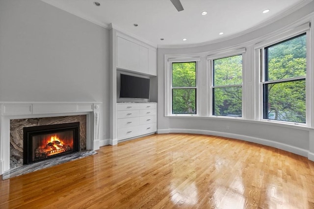 316 Beacon St Unit 1, Boston, MA 02116 - unfurnished living room featuring crown molding, a fireplace, wood finished floors, and recessed lighting