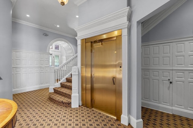 316 Beacon St Unit 1, Boston, MA 02116 - staircase with arched walkways, ornamental molding, tile patterned floors, and recessed lighting