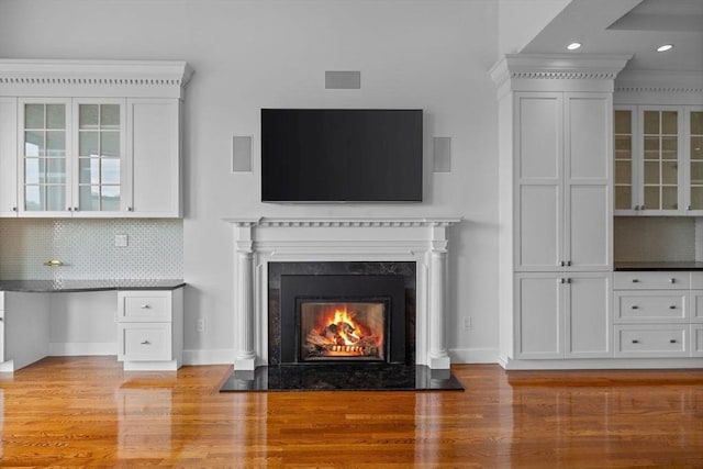 316 Beacon St Unit 1, Boston, MA 02116 - unfurnished living room with light wood finished floors, recessed lighting, and a premium fireplace